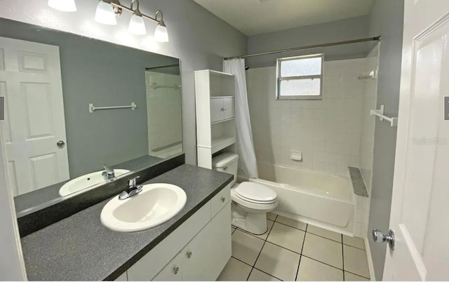 bathroom with tile patterned floors, vanity, toilet, and shower / tub combo