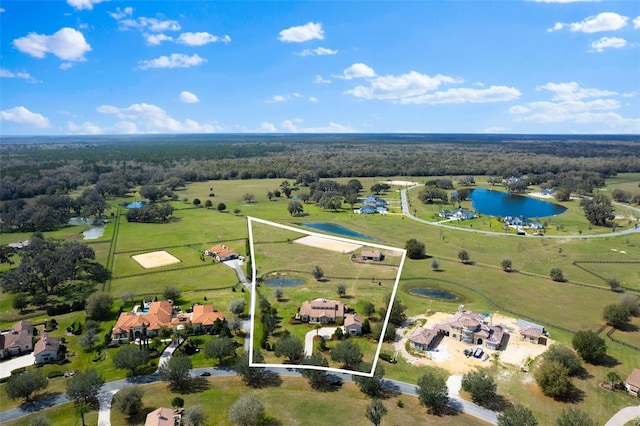 bird's eye view with a rural view and a water view