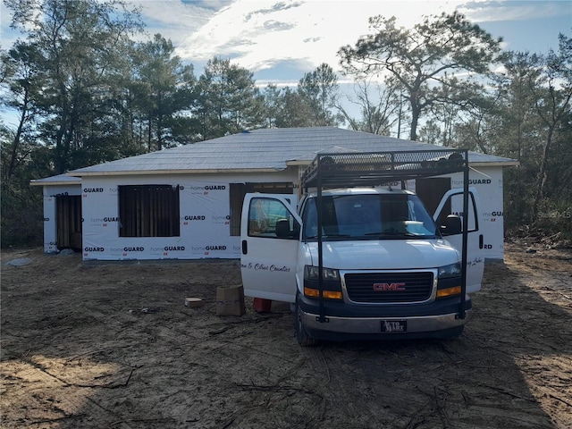 exterior space with a detached carport