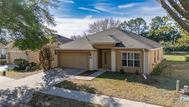 ranch-style home with stucco siding, roof with shingles, concrete driveway, and an attached garage