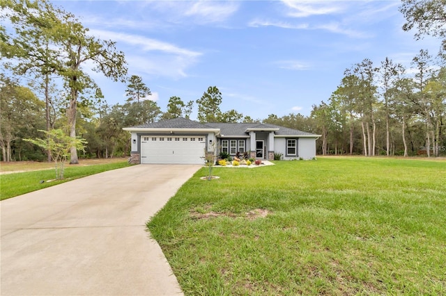 view of front of home with a garage, a front yard, and driveway