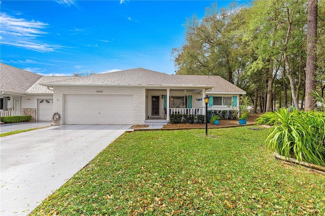 ranch-style house featuring roof with shingles, a porch, an attached garage, a front yard, and driveway