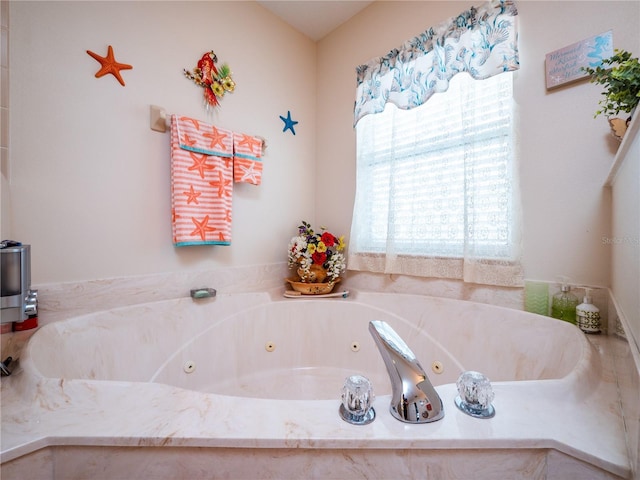 bathroom with a jetted tub