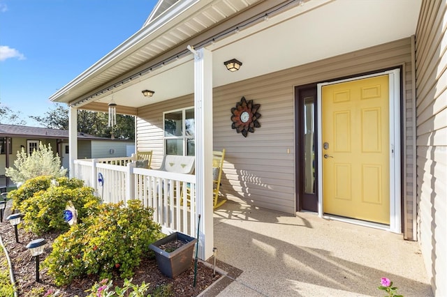 entrance to property with covered porch