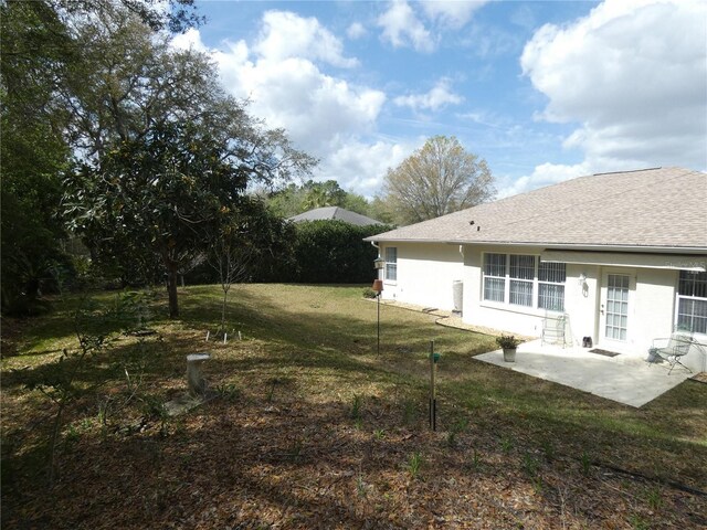 view of yard with a patio area