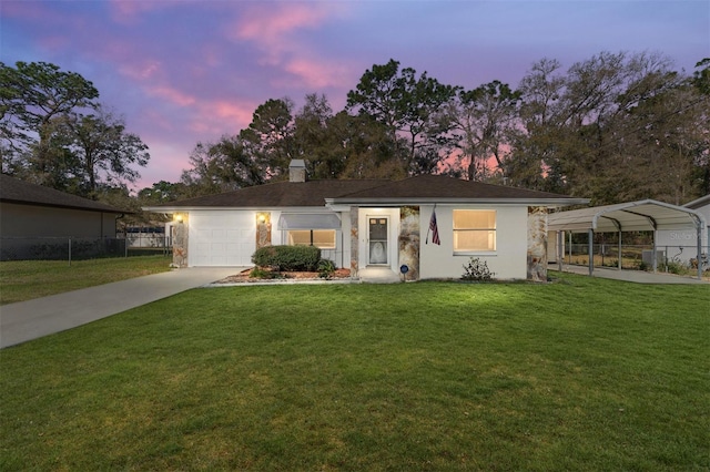 ranch-style home featuring driveway, a chimney, fence, and a front lawn