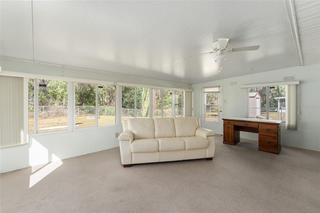 sunroom / solarium featuring ceiling fan