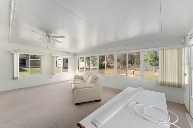 sunroom / solarium with ceiling fan