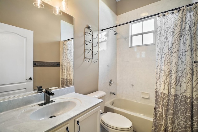 full bathroom featuring shower / tub combo, vanity, and toilet