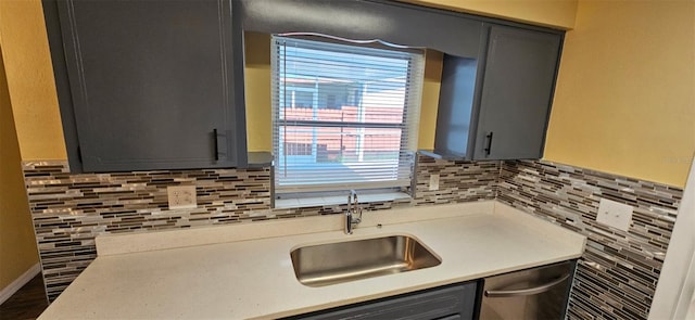 31 Roosevelt Blvd, Beverly Hills, FL 34465 - kitchen featuring stainless steel dishwasher, light countertops, a sink, and gray cabinetry