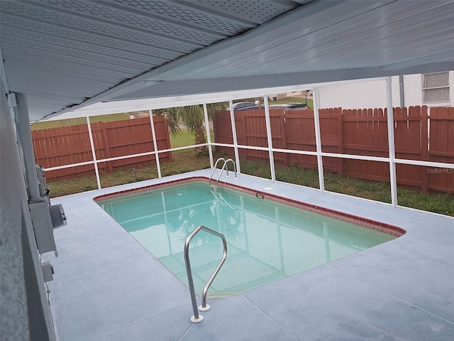 31 Roosevelt Blvd, Beverly Hills, FL 34465 - view of swimming pool with glass enclosure, a patio, a fenced backyard, and a fenced in pool