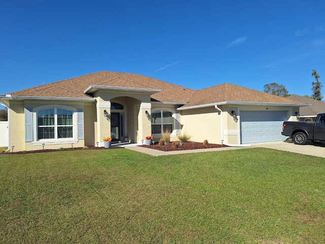 single story home with an attached garage, driveway, a front yard, and stucco siding