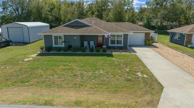 ranch-style house featuring stucco siding, a shingled roof, an attached garage, a front yard, and driveway