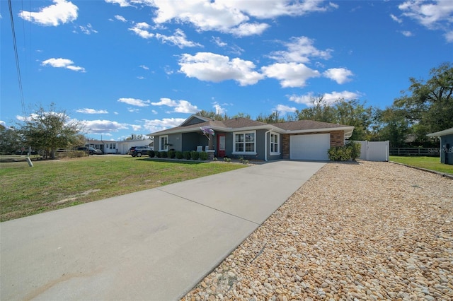 ranch-style home with a garage, driveway, a front yard, and fence