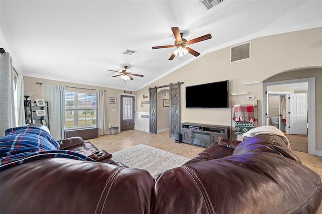 living area with visible vents, vaulted ceiling, arched walkways, and ornamental molding