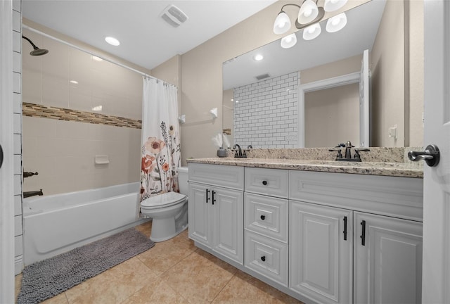 full bathroom featuring shower / tub combo with curtain, visible vents, toilet, a sink, and tile patterned flooring