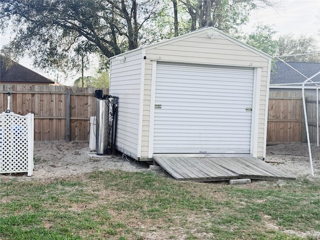 view of shed with a fenced backyard