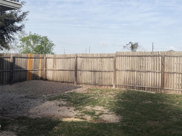 view of yard featuring a fenced backyard