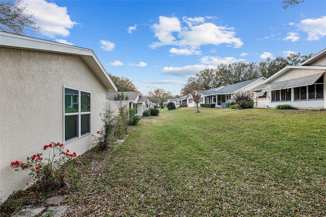 view of yard with a residential view