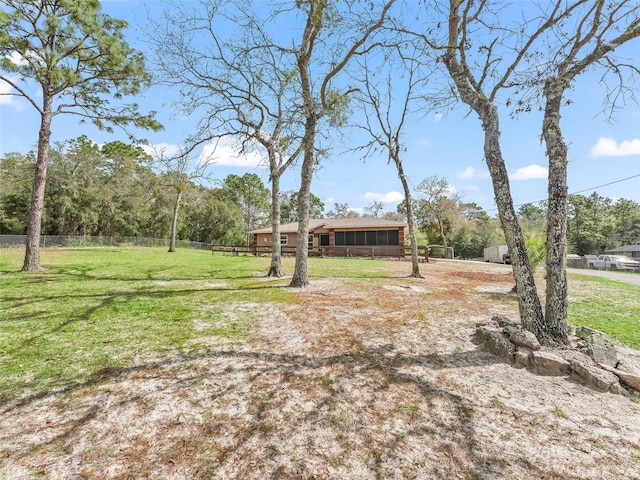 view of yard featuring fence