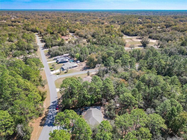 aerial view featuring a view of trees