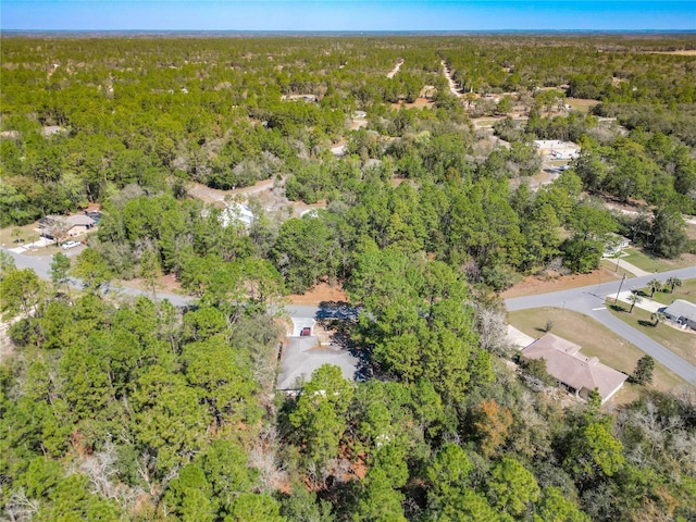 bird's eye view featuring a view of trees