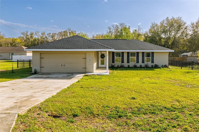 ranch-style house with an attached garage, fence, driveway, and a front lawn