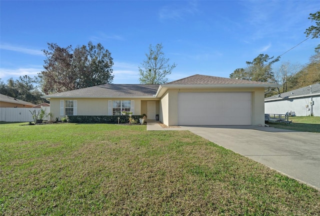 single story home featuring a front yard, driveway, fence, and stucco siding