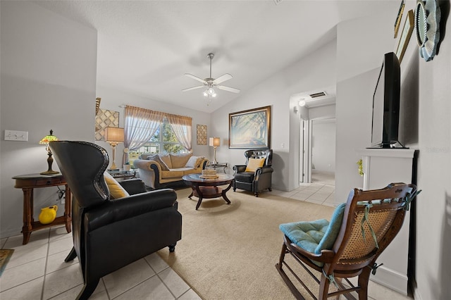 living room with lofted ceiling, light tile patterned floors, light colored carpet, visible vents, and a ceiling fan