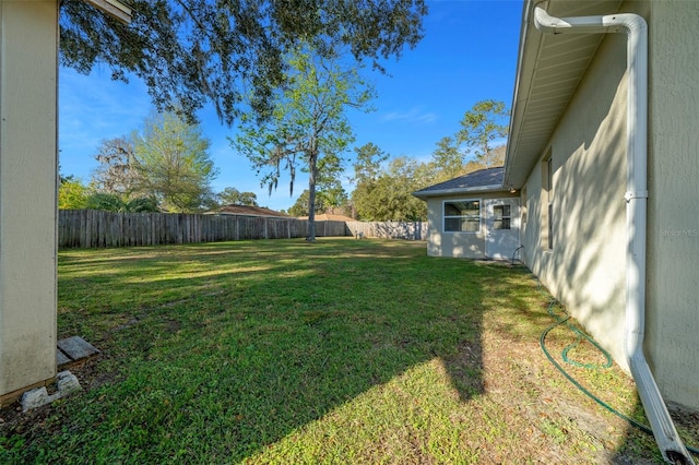 view of yard featuring a fenced backyard