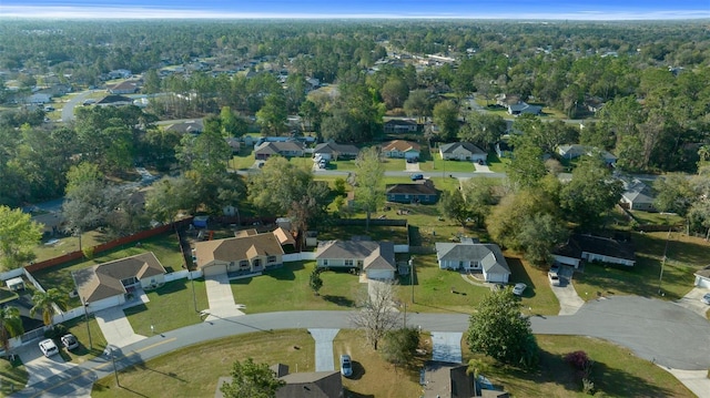 bird's eye view with a residential view and a view of trees