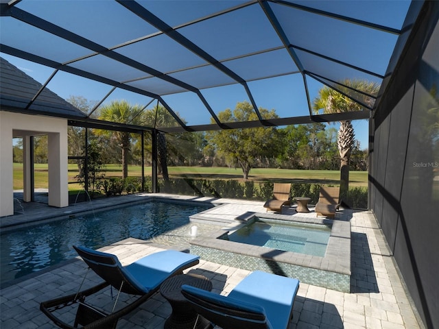 pool with glass enclosure and a patio