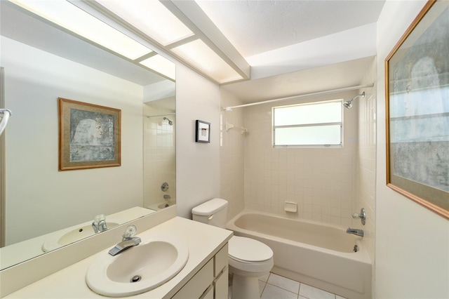 bathroom with shower / washtub combination, tile patterned flooring, vanity, and toilet