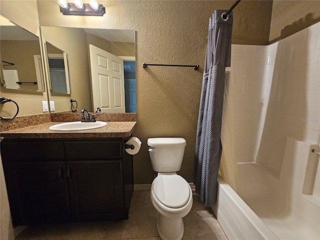 full bath with a textured wall, toilet, shower / tub combo with curtain, tile patterned floors, and vanity