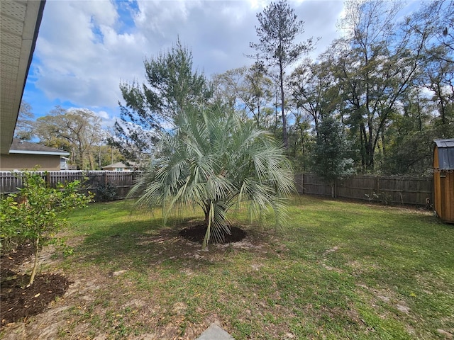 view of yard featuring a fenced backyard