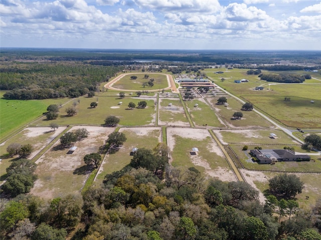 birds eye view of property featuring a rural view