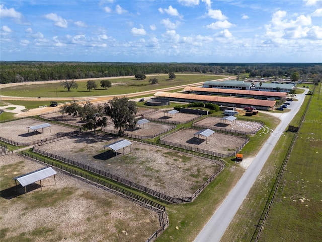 birds eye view of property with a rural view