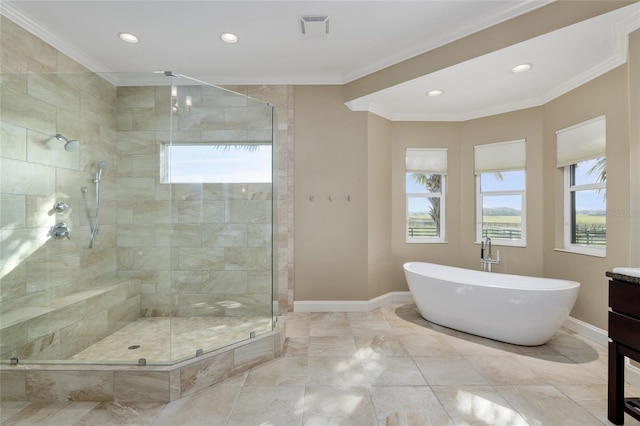 full bath with visible vents, baseboards, a soaking tub, ornamental molding, and a shower stall