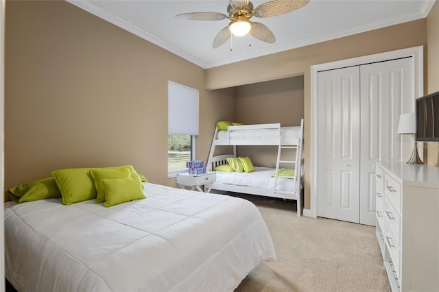 bedroom with light carpet, a ceiling fan, and crown molding