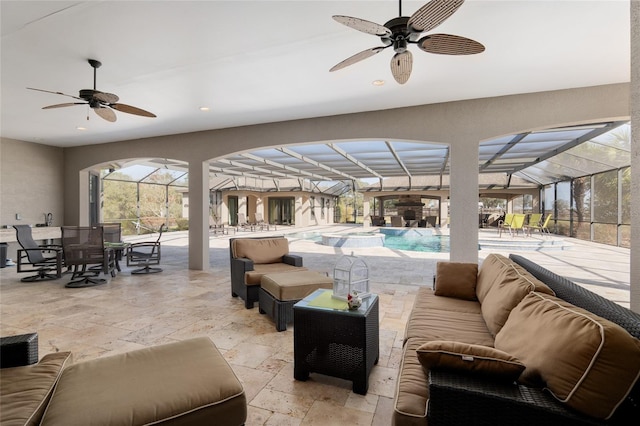 view of patio / terrace with glass enclosure, outdoor dining space, an outdoor living space, and an outdoor pool