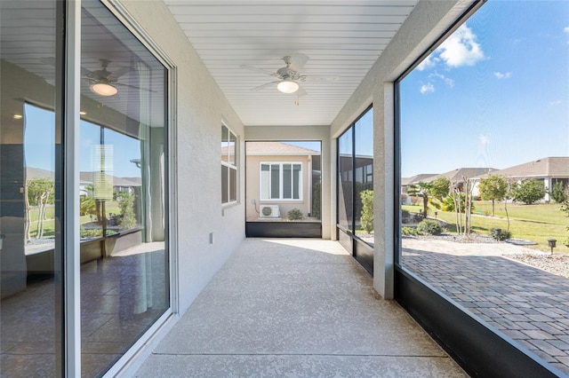 sunroom / solarium with ceiling fan