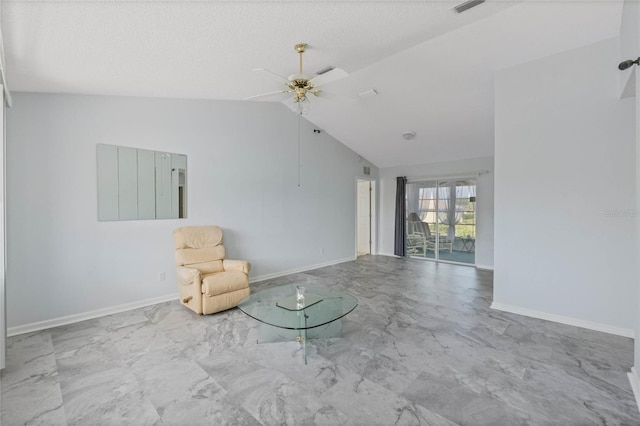 unfurnished room featuring lofted ceiling, marble finish floor, and baseboards