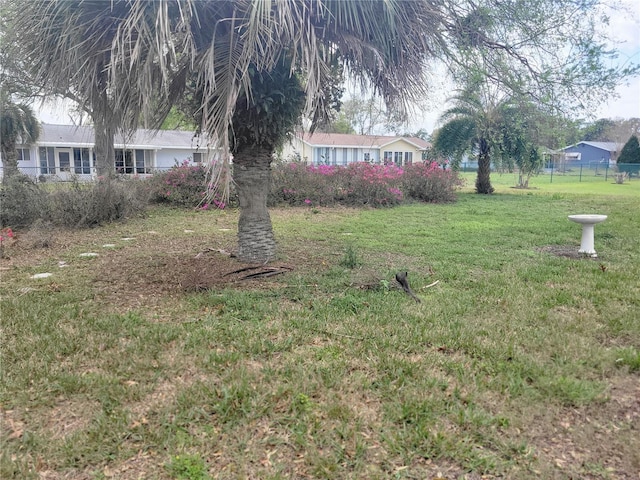 view of yard with fence