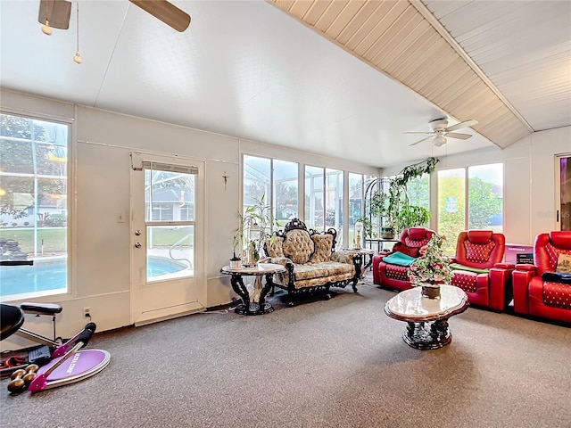 sunroom / solarium featuring a ceiling fan