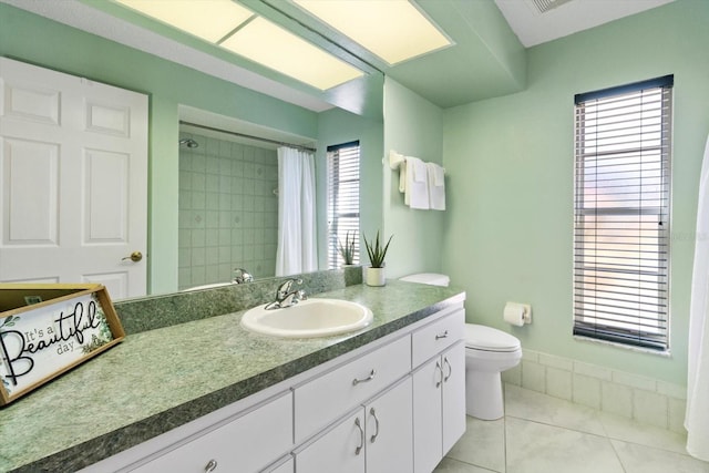 full bath featuring baseboards, toilet, a shower with curtain, tile patterned flooring, and vanity