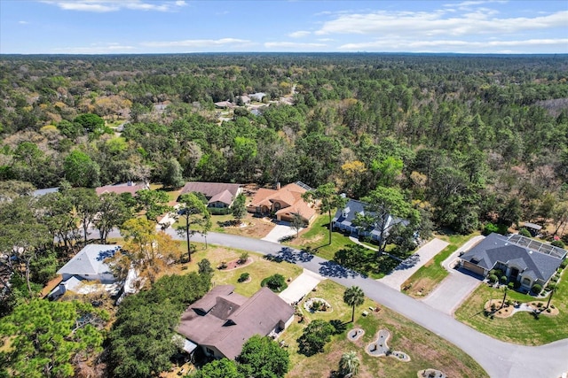 drone / aerial view with a forest view