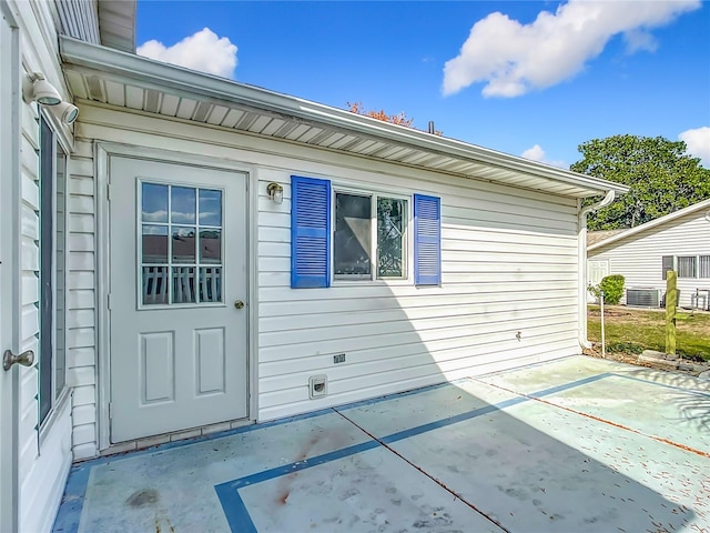 doorway to property with a patio area