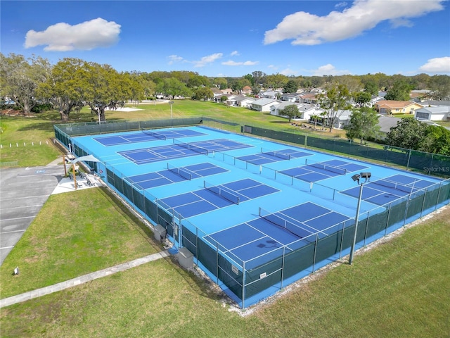 birds eye view of property with a residential view