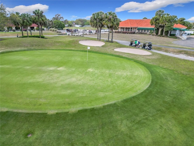 view of home's community featuring view of golf course