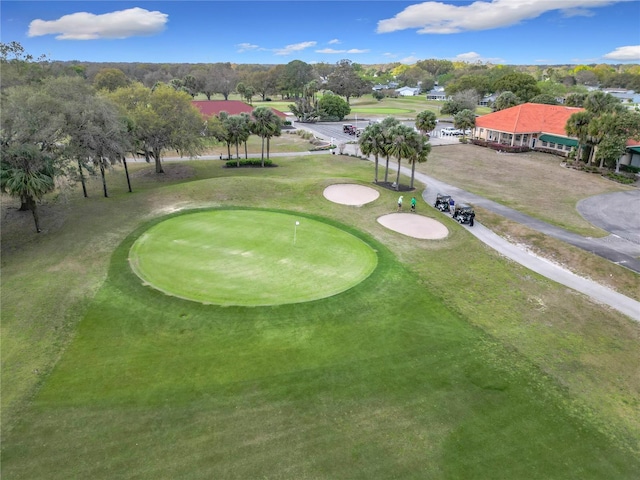 view of home's community featuring view of golf course